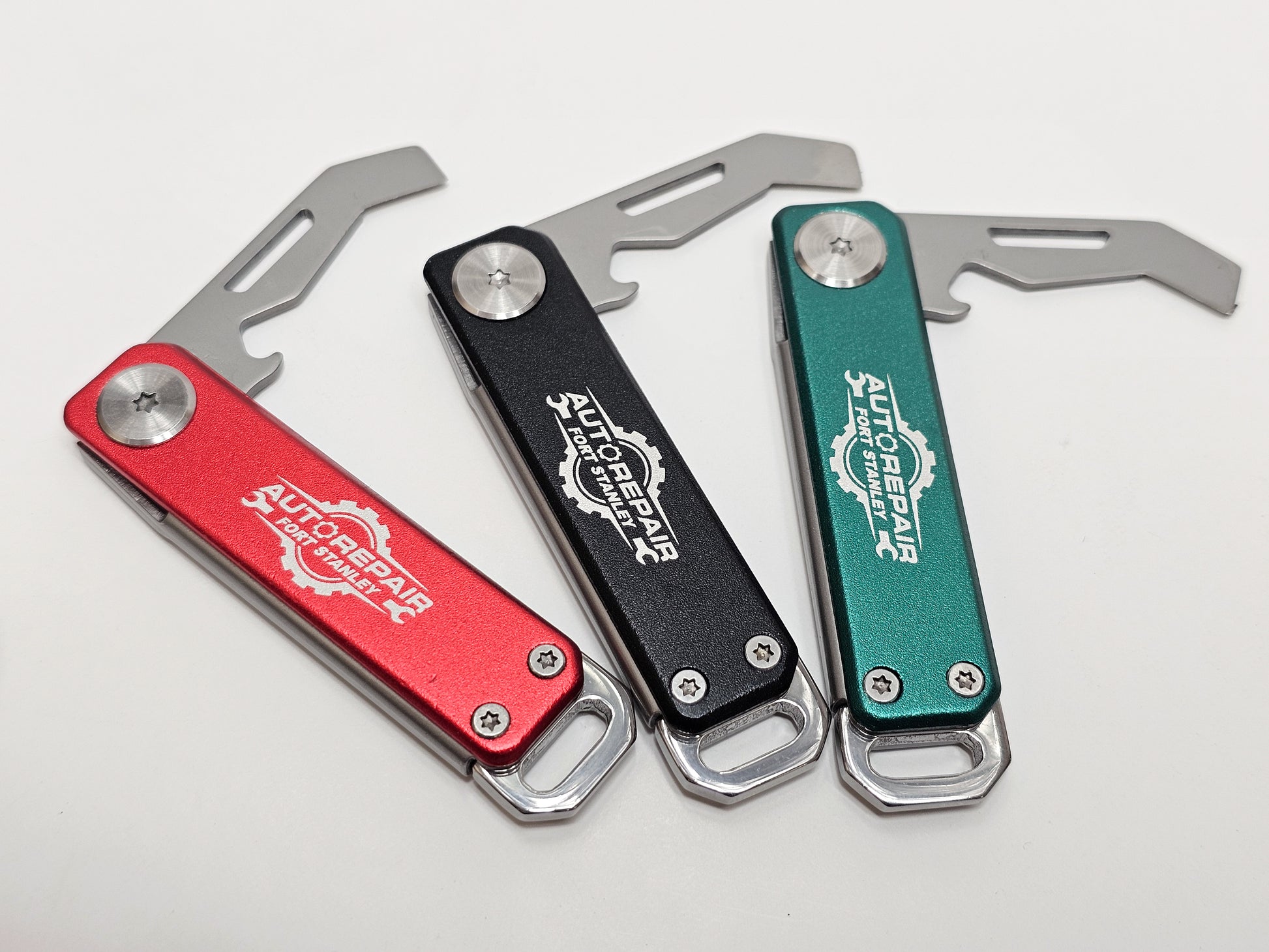 Folding box cutter with built in bottle opener promotional product with laser logo