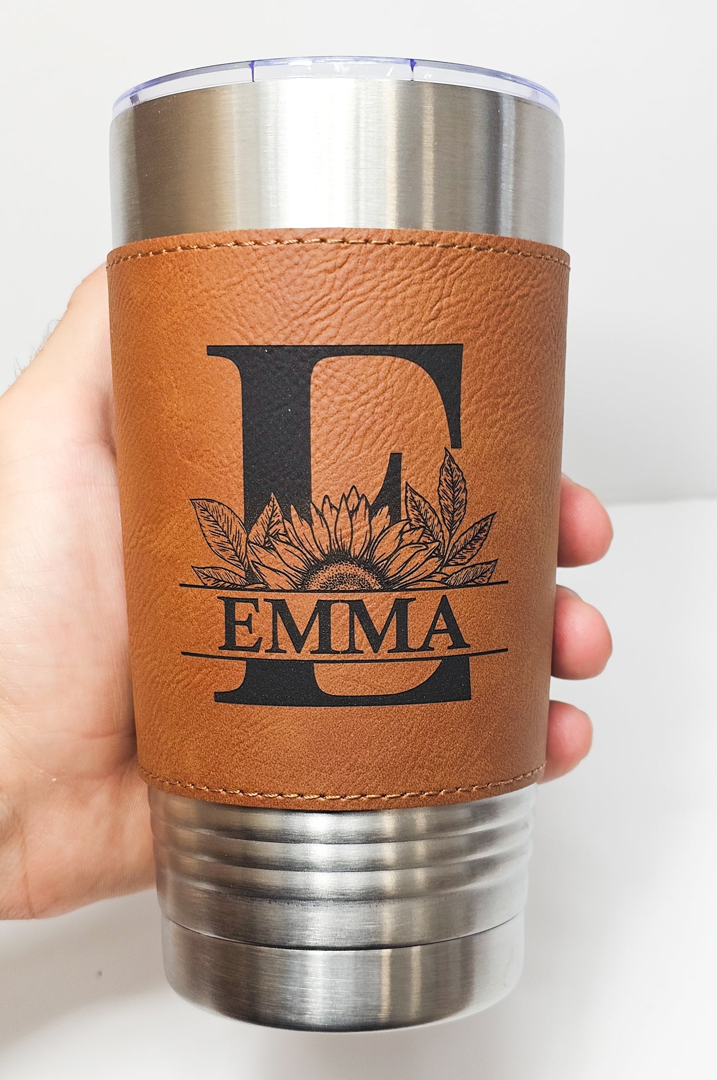 Promotional giveaway 20 oz tumbler with leather sleeve